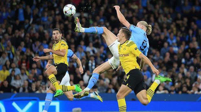 哈兰德上演伊布式神仙球！曼城破曼联欧冠不败纪录